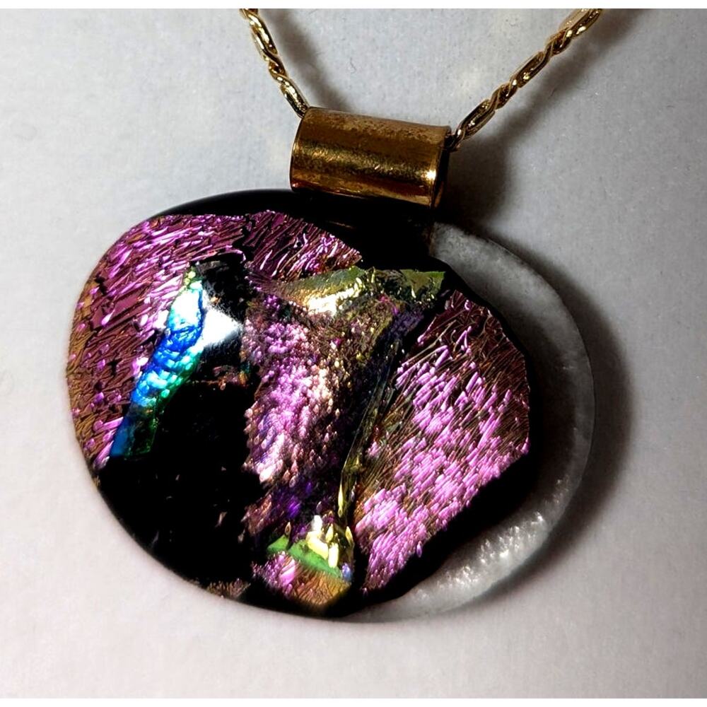 Dichroic fused glass 1 3/8" x 1 1/4" Gold plated chain 20" Brass bail.